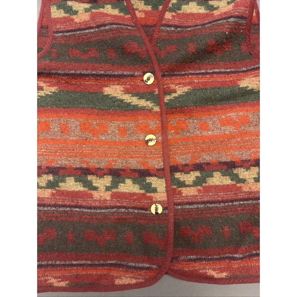 Ride brand Southwestern-style vest features a vibrant geometric pattern in red L